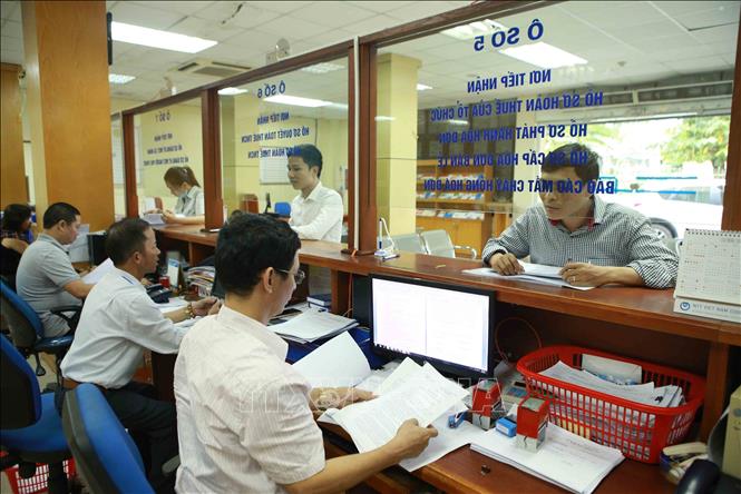 thue-200225 Tài xế chạy app cần đóng những loại thuế nào?